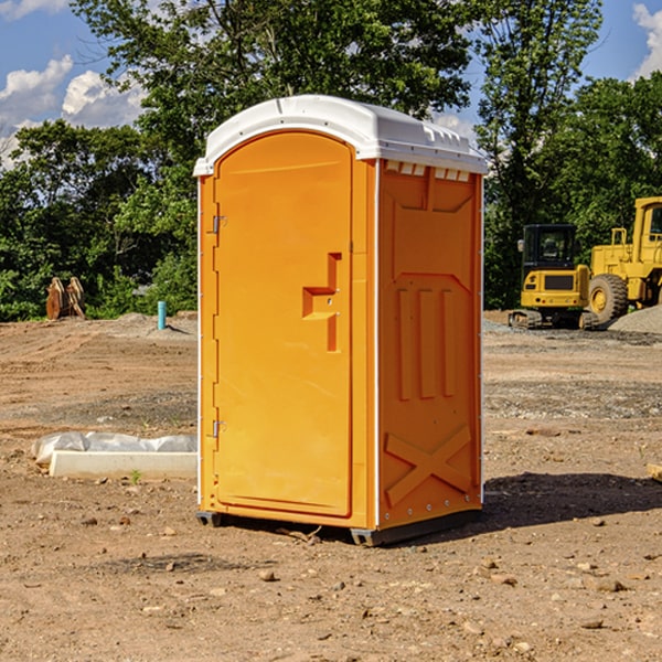 how often are the portable restrooms cleaned and serviced during a rental period in Elliott Illinois